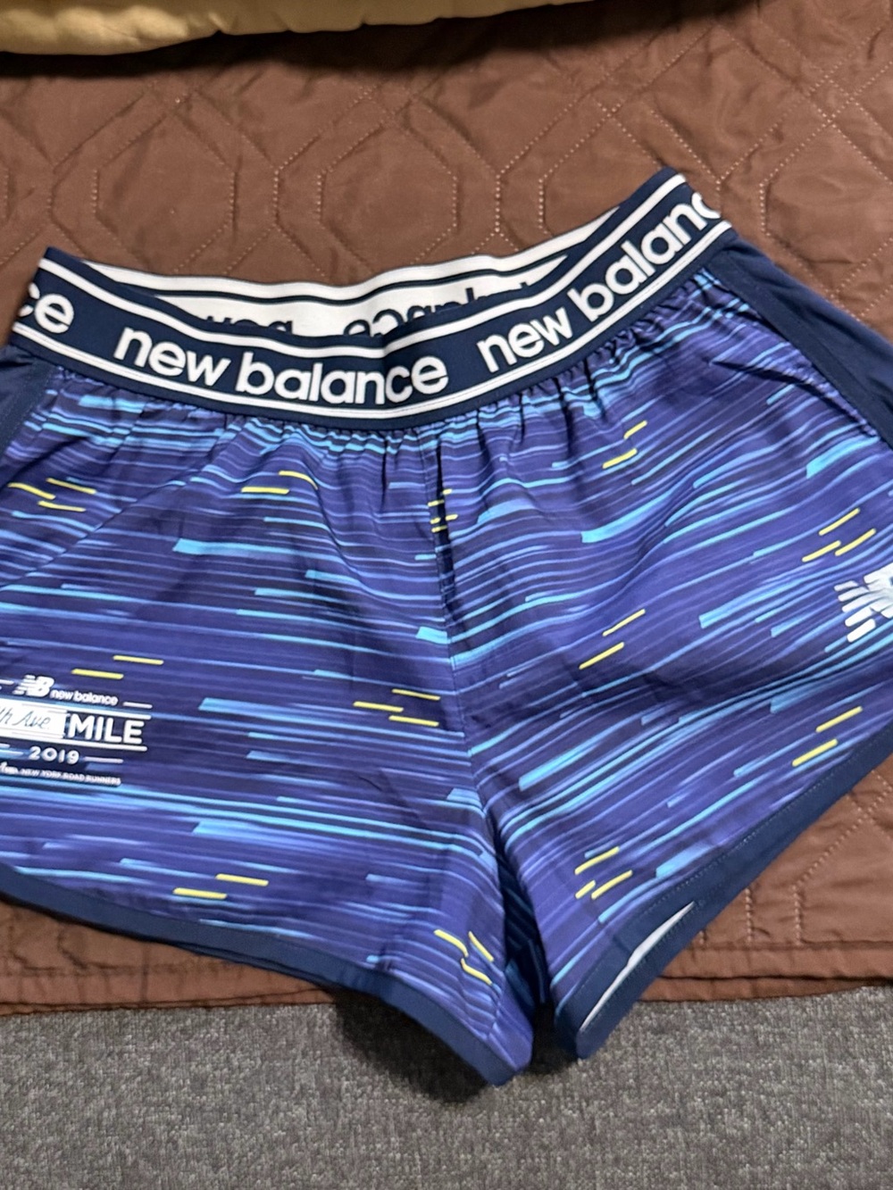 New Balance Women's Navy & Blue Patterned Athletic Shorts with Yellow Accents